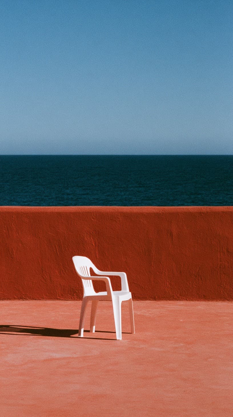 White Chair Facing the Sea